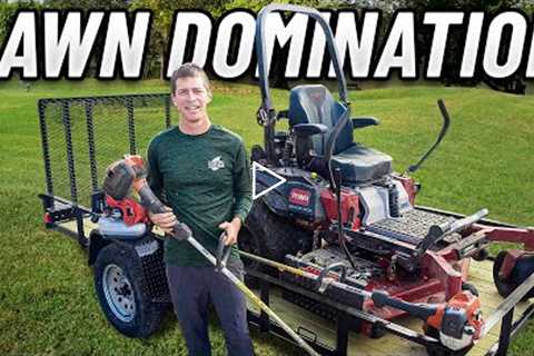 Lawn Care Equipment Setup with Zero Turn Mower, String Trimmers and Backpack Blower on a Trailer