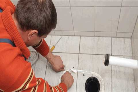 When tiling a bathroom floor do you tile under the toilet?