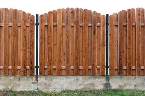 Seasonal Wood Fence Care: Spring, Summer, Fall, and Winter