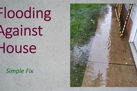 Cutting a swale to relieve driveway and crawlspace flooding