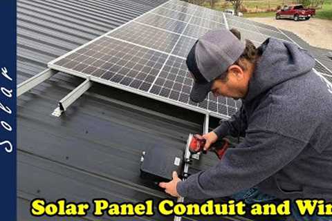 Installing Conduit and Wire to Roof Mounted Solar Panels