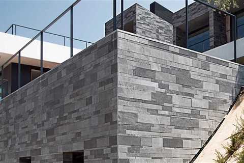 The Rarely Mentioned Connection Between Stone Facades and Roof Expansion Movement